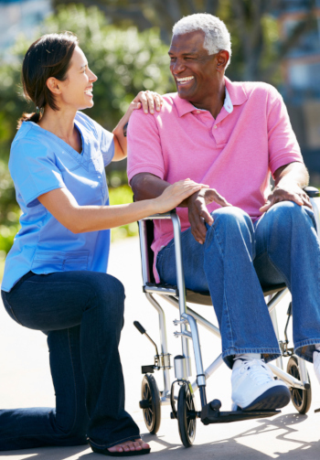 hispanic-female-caregiver-black-male-client-trim contact for home care